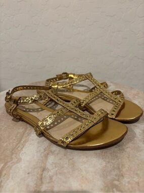 L.A.M.B. Gold gladiator strapping flat studded sandals